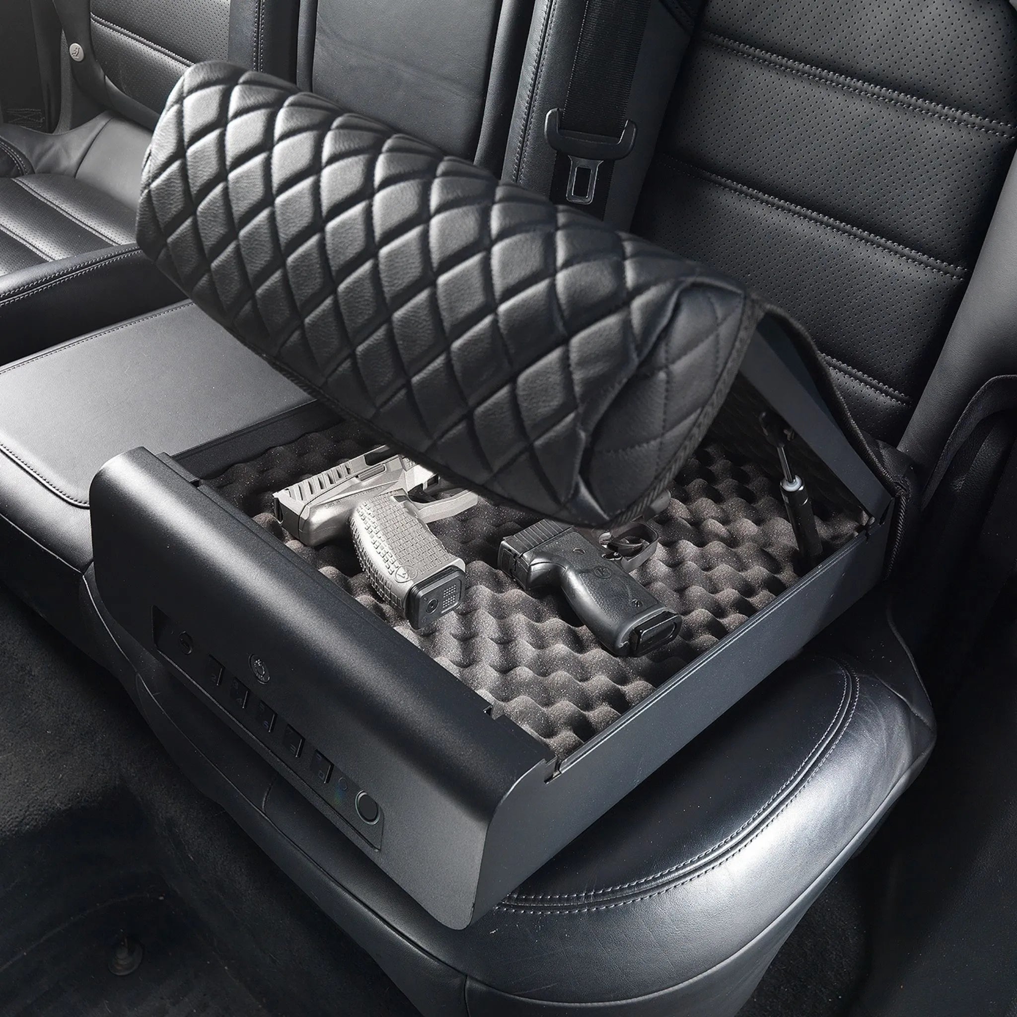 BoostedSafe Elite closing over handgun storage in a rear vehicle seat