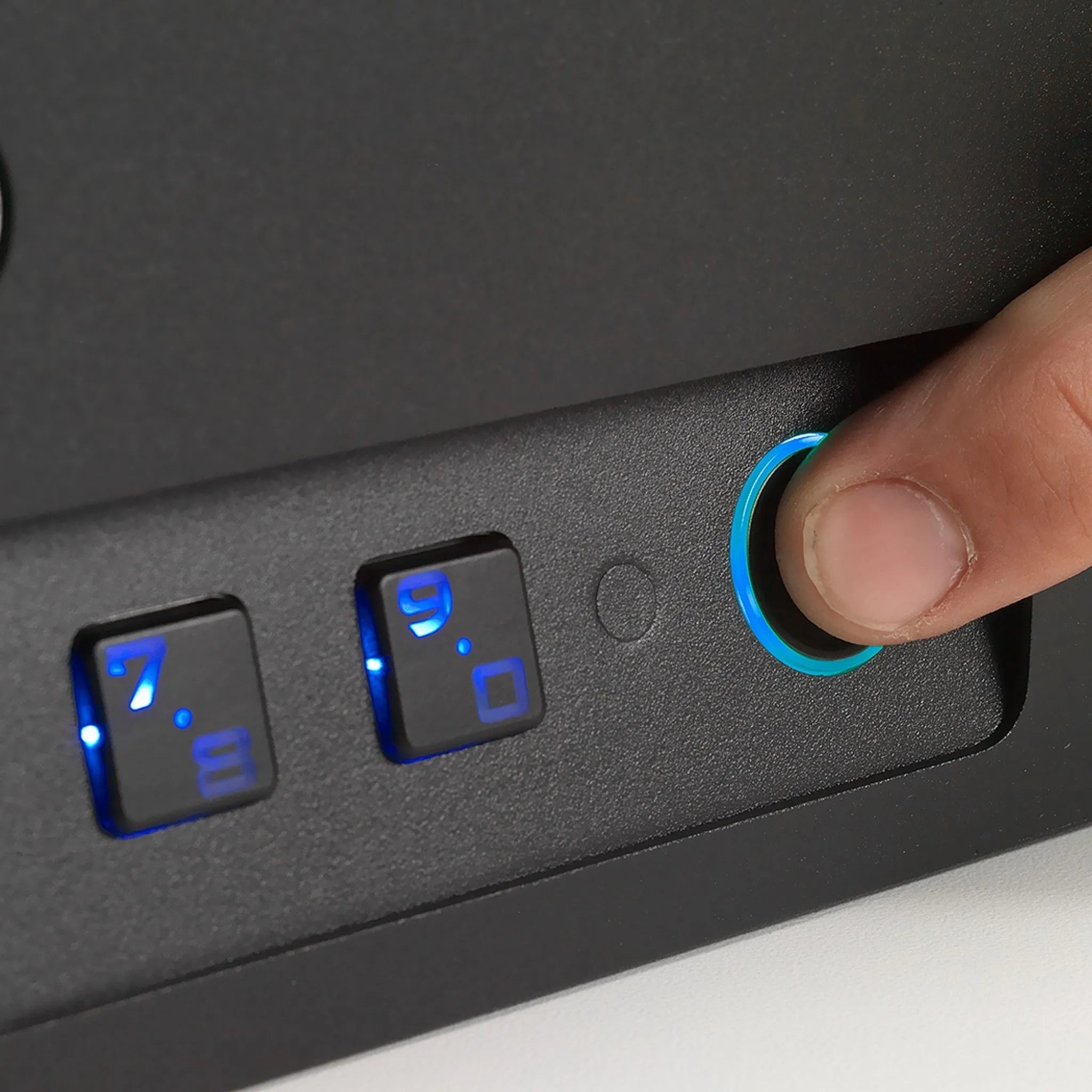 BoostedSafe Elite fingerprint unlock closeup on biometric vehicle safe keypad
