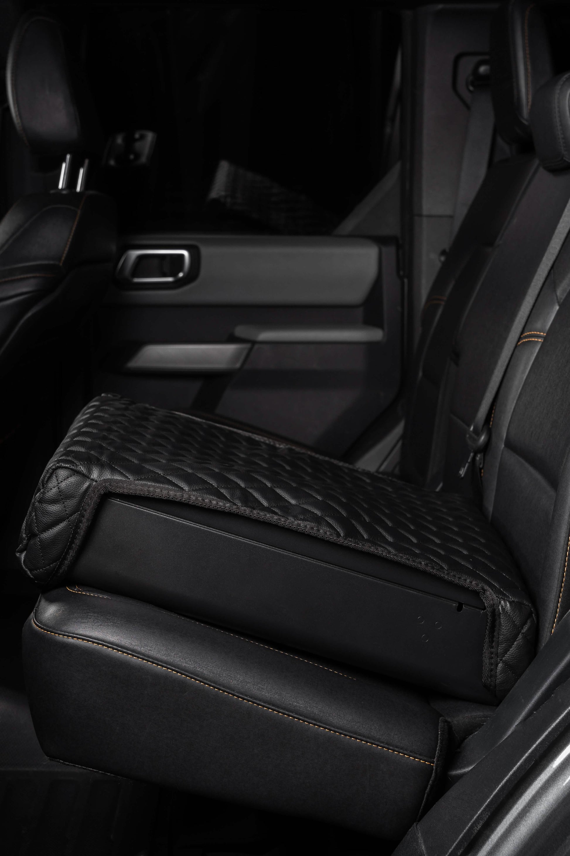 BoostedSafe Elite with quilted leather cover installed rear seat