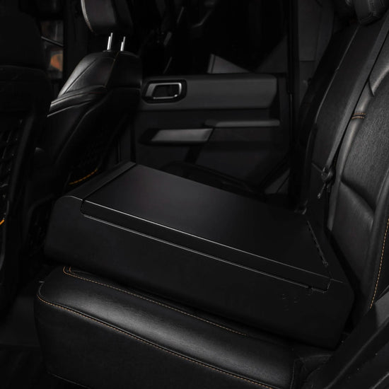 BoostedSafe Elite installed on a rear vehicle seat without the quilted booster seat disguise cover.