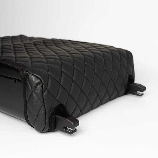 Close-up of the BoostedSafe Elite quilted booster seat disguise cover with integrated ISOFIX mounting connectors.
