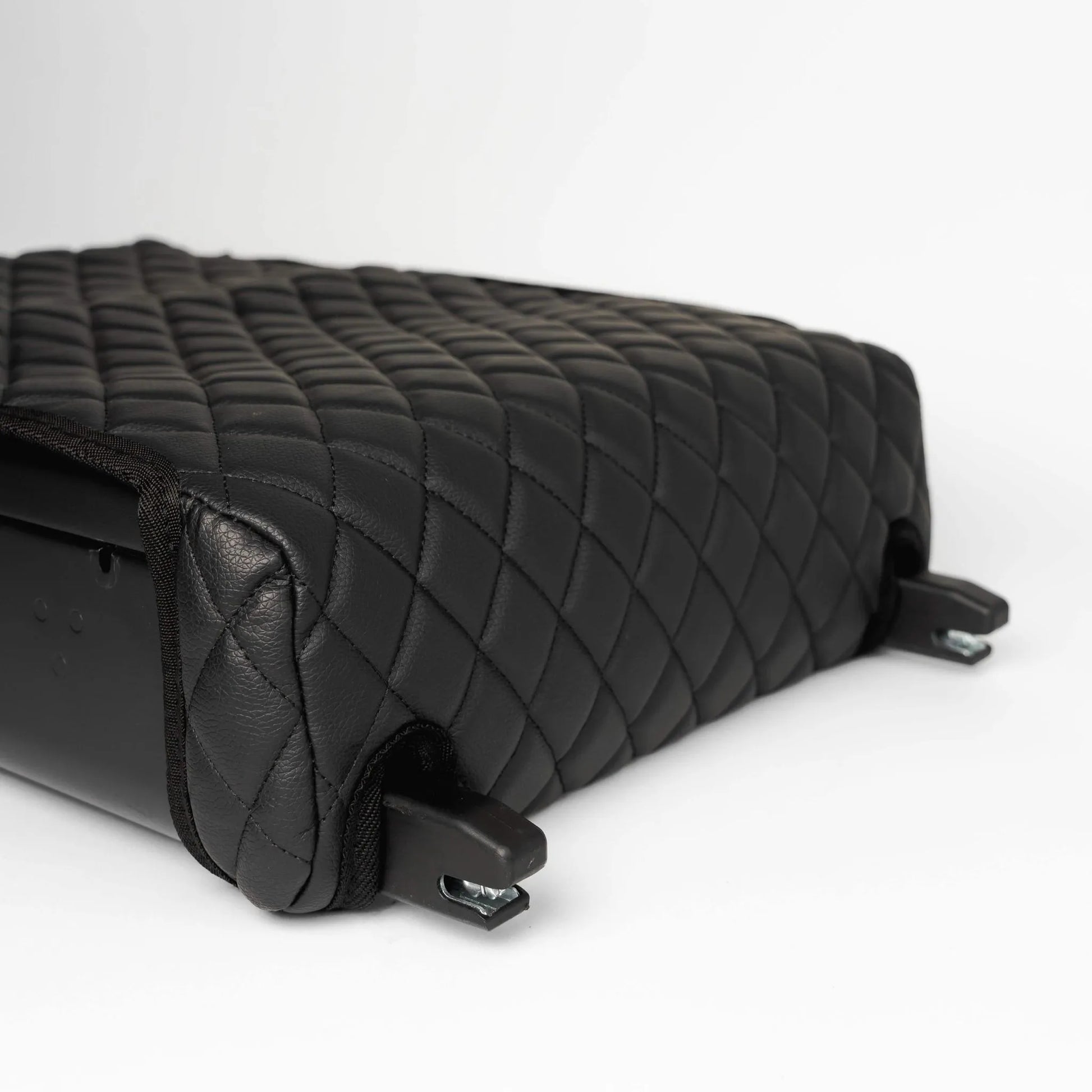 Close-up of the BoostedSafe Elite quilted booster seat disguise cover with integrated ISOFIX mounting connectors.