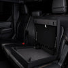Open Boosted Safe installed beneath a truck rear seat, showing the spacious foam-lined storage compartment.