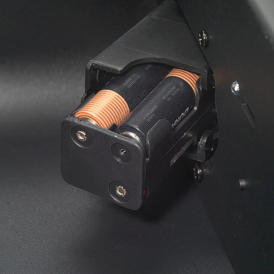 Close-up of the AA battery tray compartment inside the refurbished Boosted Safe Elite biometric vehicle safe.