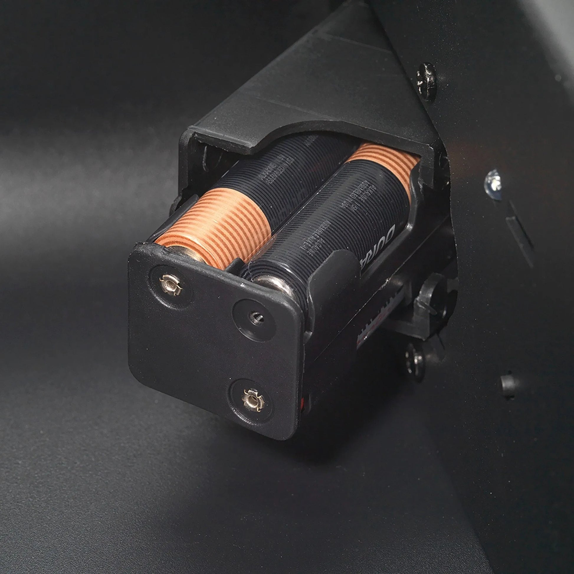 Close-up of the AA battery tray compartment inside the refurbished Boosted Safe Elite biometric vehicle safe.