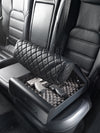 BoostedSafe Elite partially closing over two handguns in the foam-lined interior.