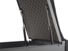 Interior close-up of BoostedSafe Elite dual gas struts supporting the padded lid.