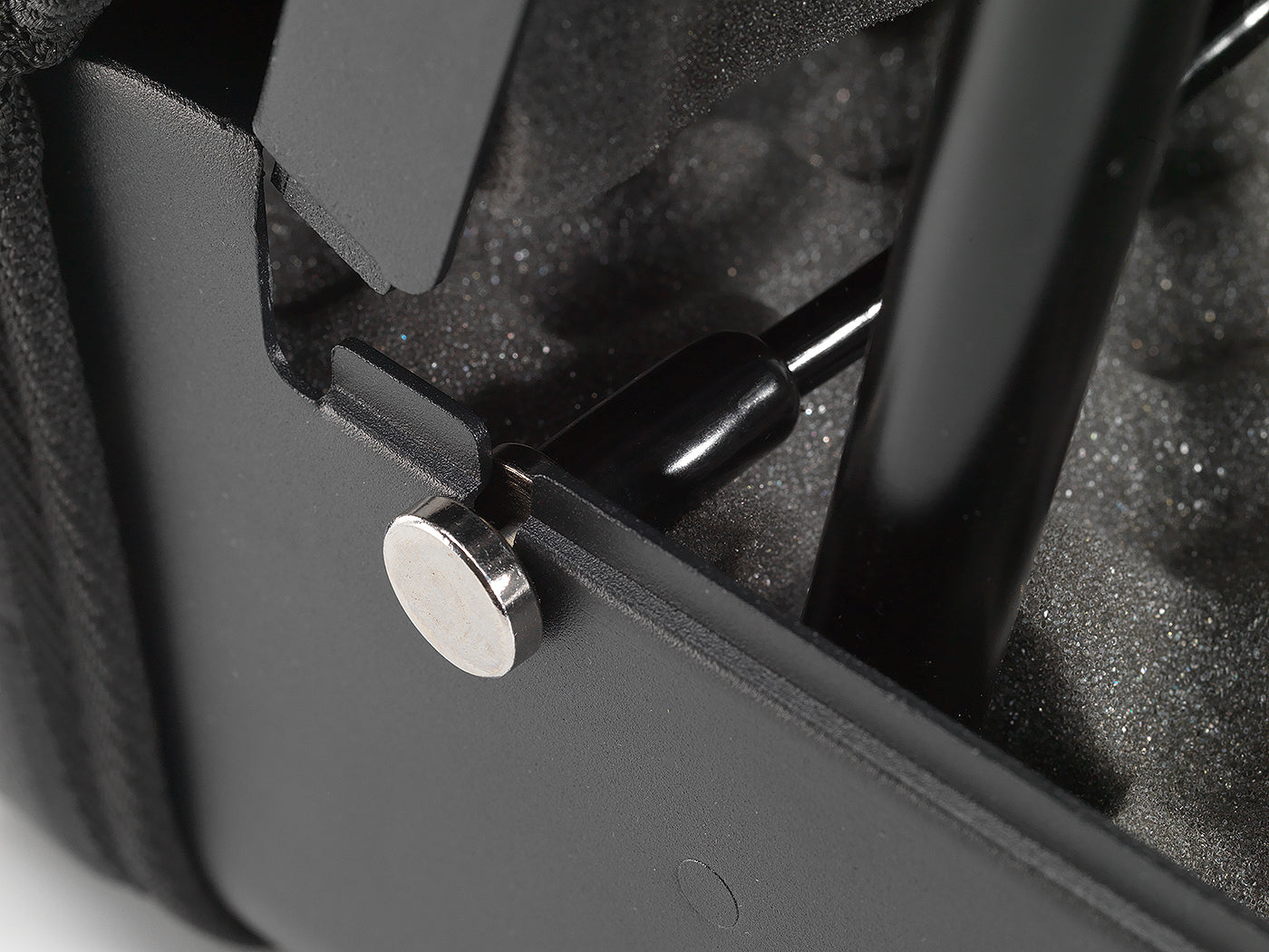 Close-up of BoostedSafe Elite gas strut mount and interior foam padding.
