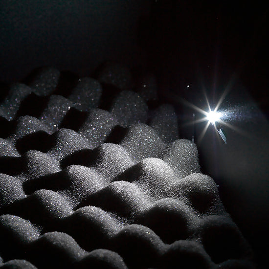 Close-up of BoostedSafe Elite interior LED lighting over protective foam padding.
