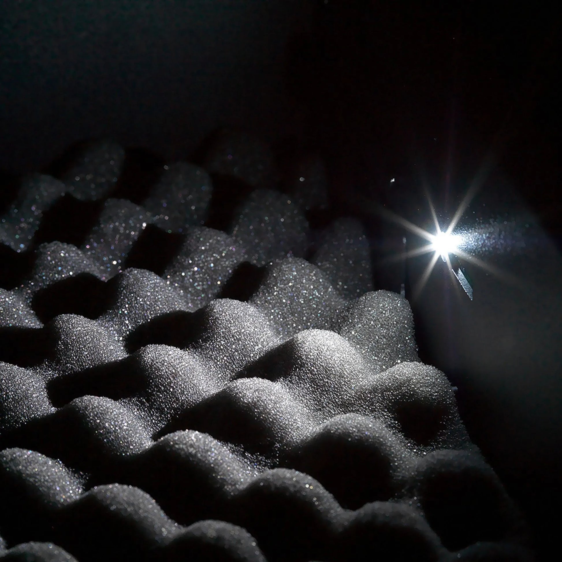 Interior LED light illuminating the foam-lined storage compartment inside the refurbished Boosted Safe Elite vehicle safe.