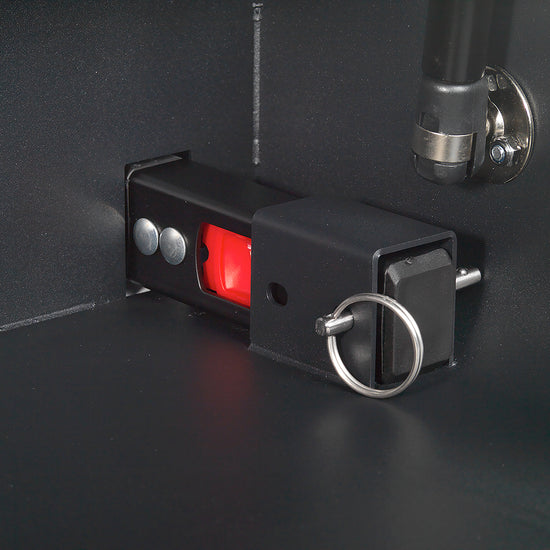 BoostedSafe Elite ISOFIX locking pin and red release latch inside the safe.