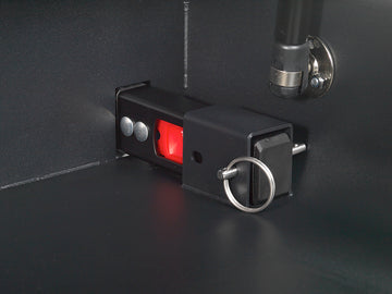 BoostedSafe Elite ISOFIX locking pin and red release latch inside the safe.
