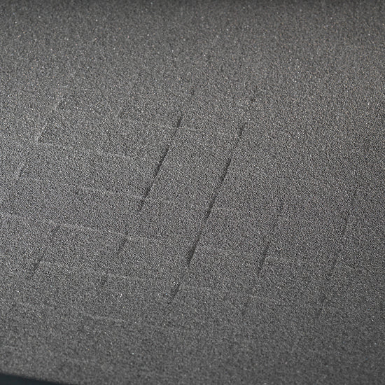 Close-up of BoostedSafe Elite modular foam insert with pre-cut grid for custom storage.