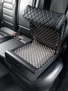 Open BoostedSafe Elite on a rear vehicle seat showing empty foam-lined interior.