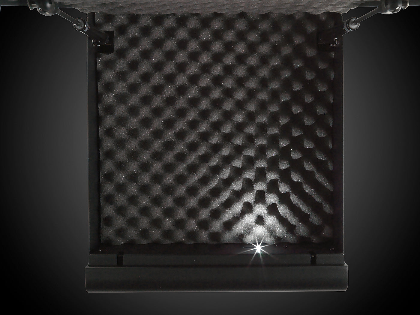 Top-down view of open BoostedSafe Elite interior with foam padding and LED light.