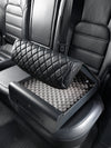 BoostedSafe Elite opening on a rear vehicle seat with interior foam padding visible.