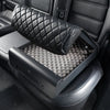 BoostedSafe Elite open on a rear vehicle seat showing the foam-lined storage compartment and quilted booster seat disguise cover.