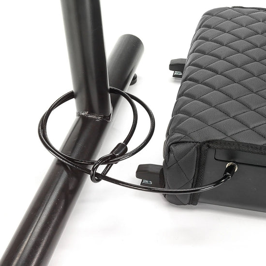 Boosted Safe Elite secured with included steel security cable wrapped around a fixed mounting bar.
