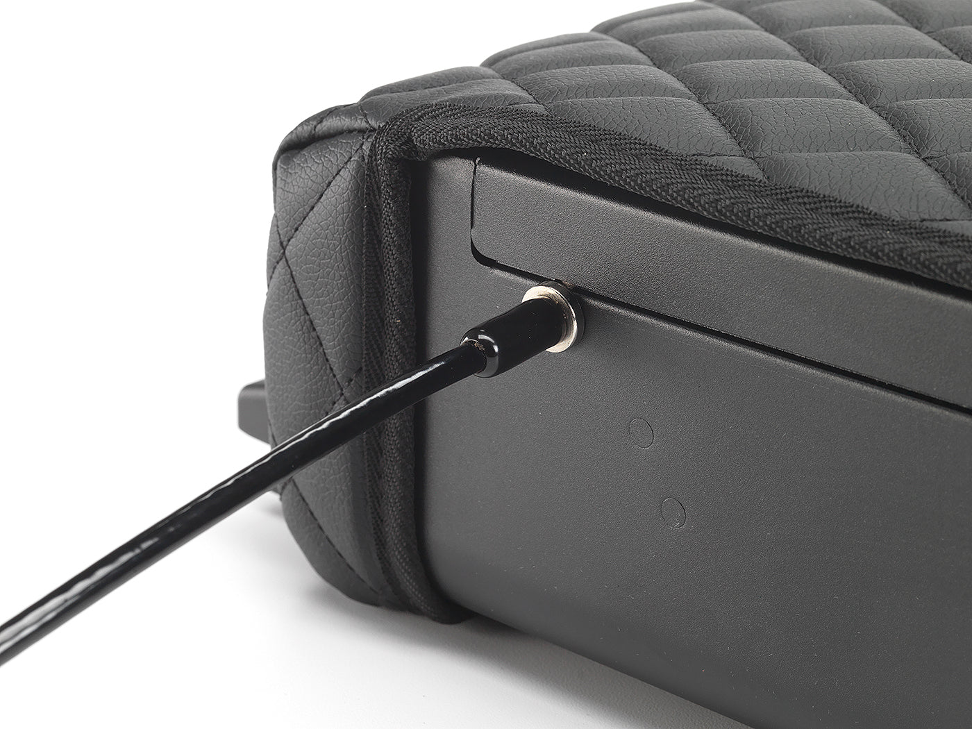 Close-up of security cable locked into the side of a closed BoostedSafe Elite.