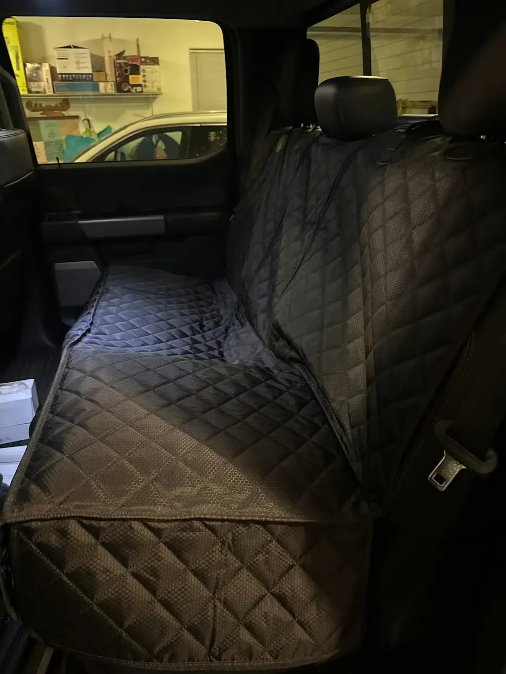 BoostedSafe hidden vehicle safe installed in rear truck seating area.