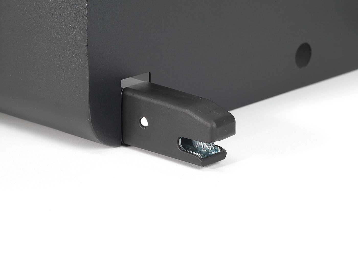 Studio close-up of BoostedSafe ISOFIX connector on the back of the safe.