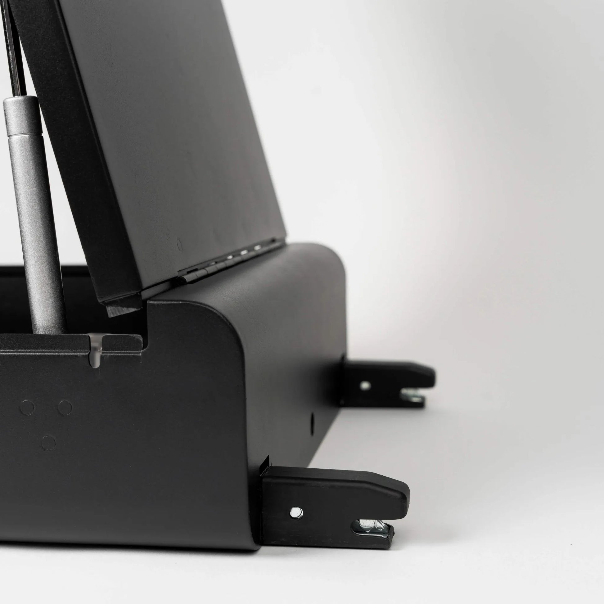 Side view of the BoostedSafe Elite showing gas hinge lid support and integrated ISOFIX mounting connectors.