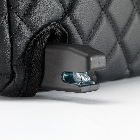 Close-up of the BoostedSafe Elite ISOFIX connector attached beside the quilted booster seat disguise cover.