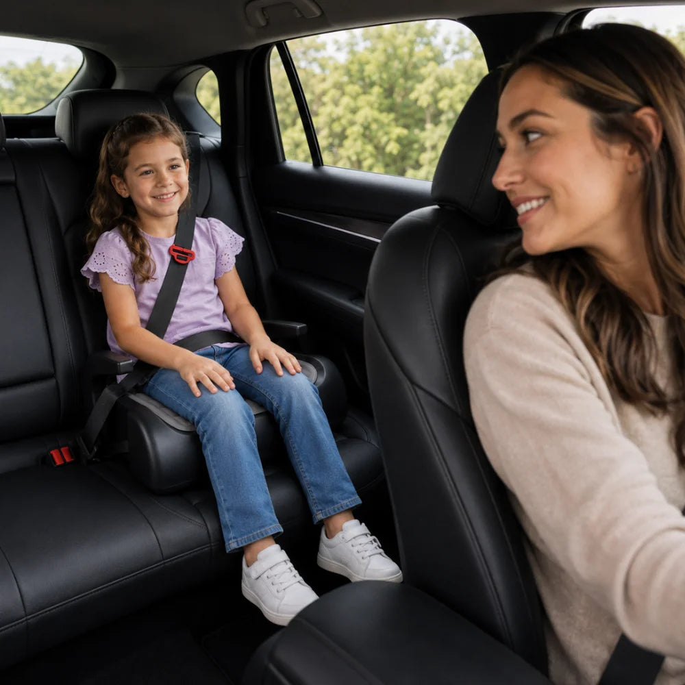 Child properly seated and buckled with the lap-and-shoulder belt in the BoostedSafe Mini Elite booster seat