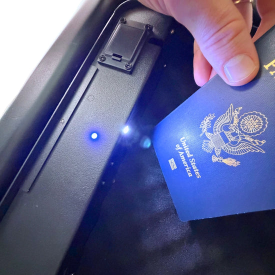 Built-in LED light illuminating a passport inside the BoostedSafe Mini Elite hidden safe