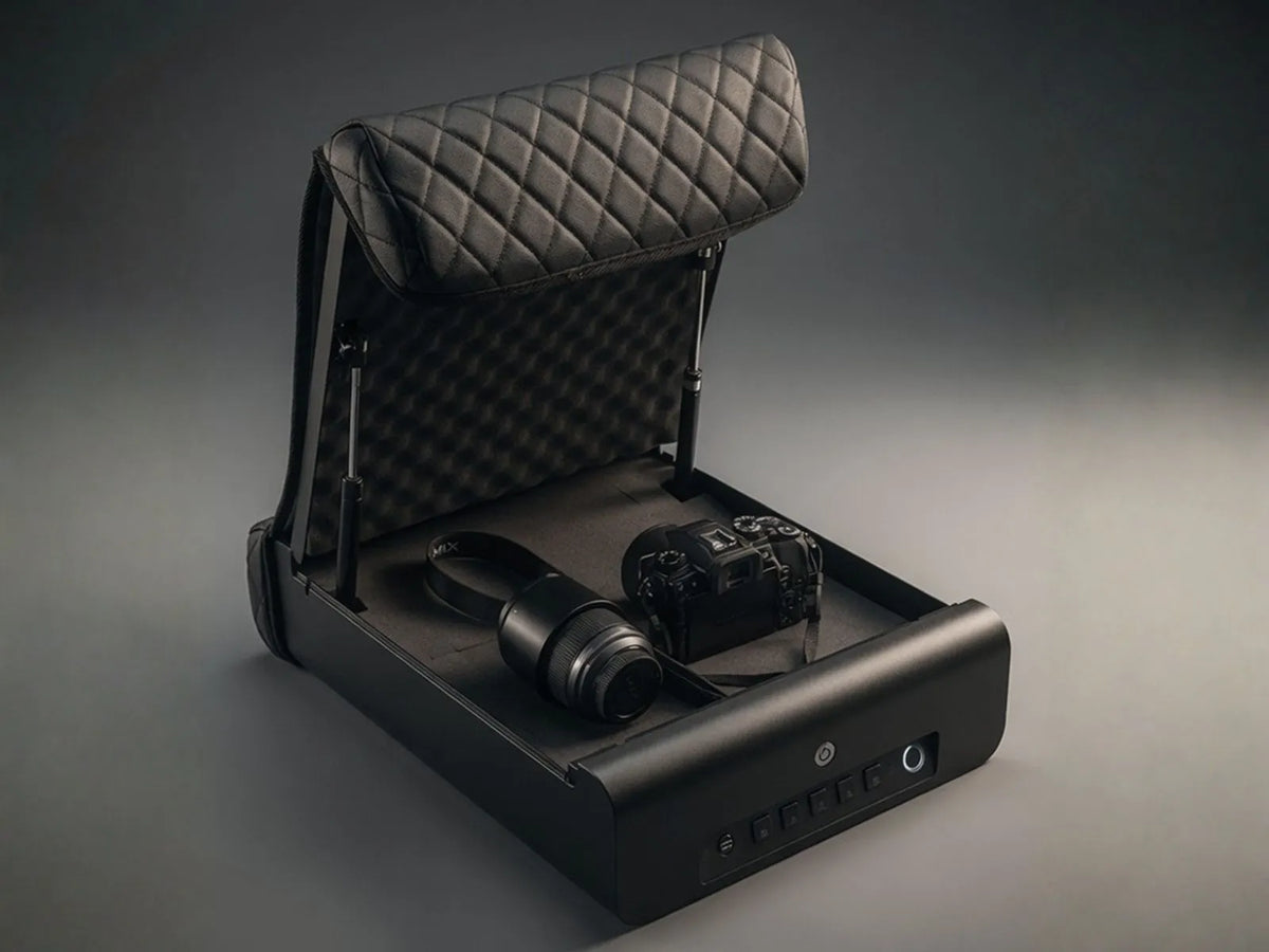 Open BoostedSafe storing a camera and lens inside the protective foam-lined compartment.