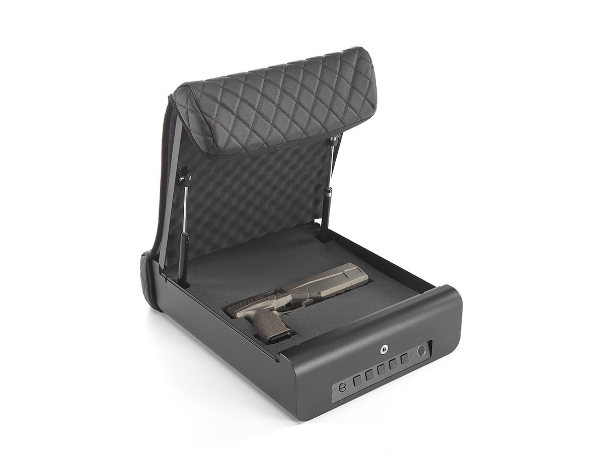 Open Boosted Safe Elite car gun safe with a pistol in the safe's lined compartment