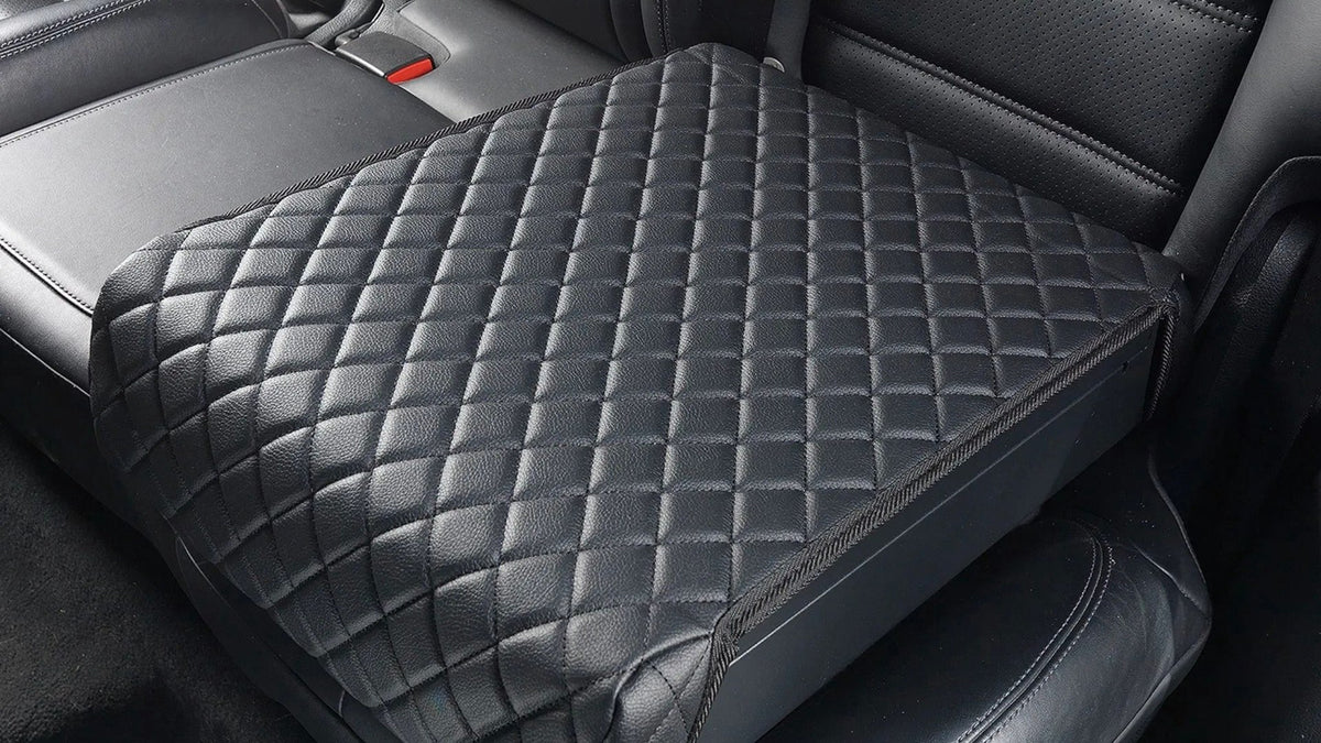Golden Gate Elite under its cover on the back seat of a car