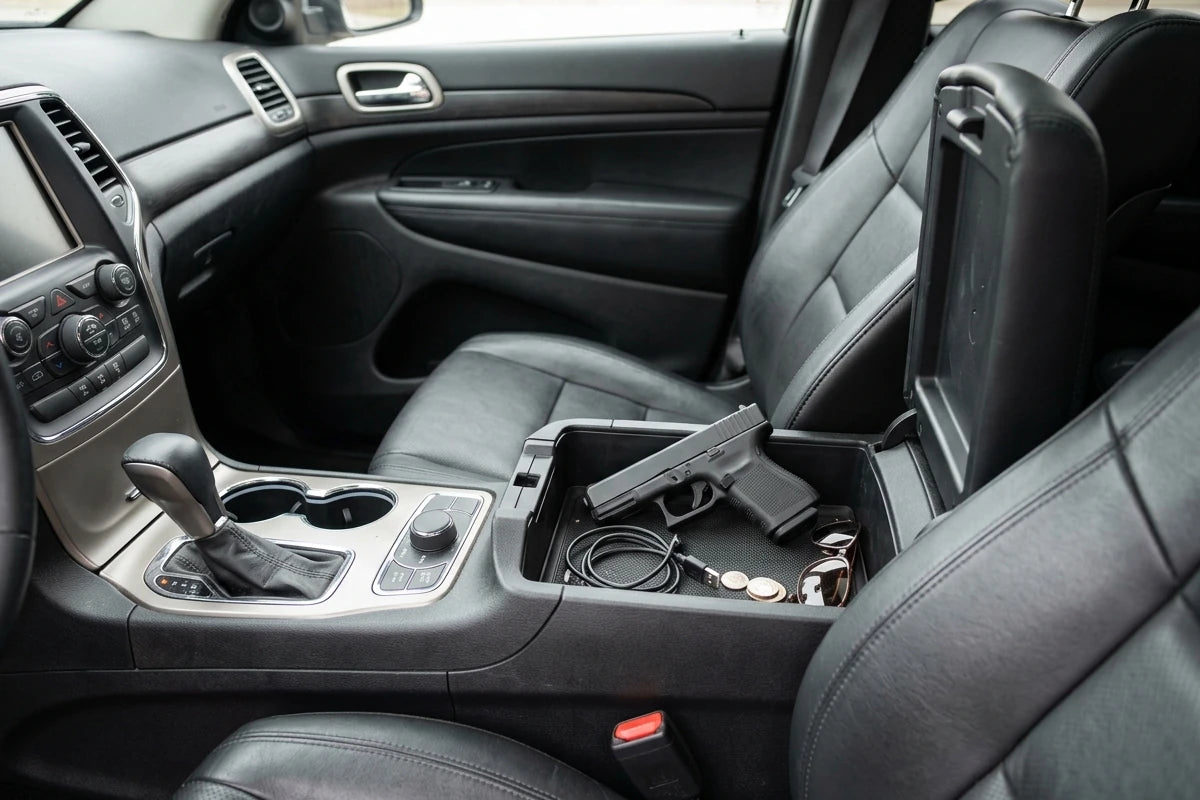 Handgun in vehicle center console