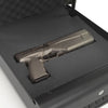 Handgun securely stored inside the custom-cut foam insert of the refurbished Boosted Safe Elite vehicle safe.